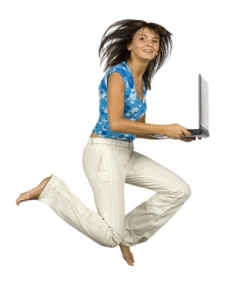 jumping happy woman with laptop